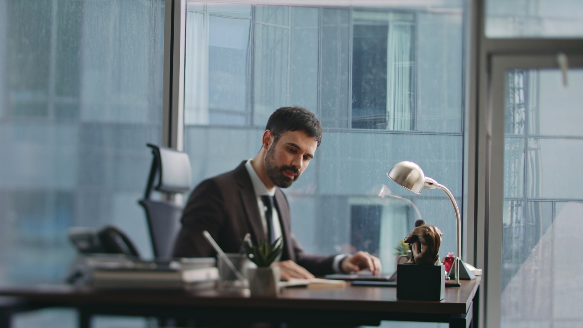 Professional businessman working in modern corporate office